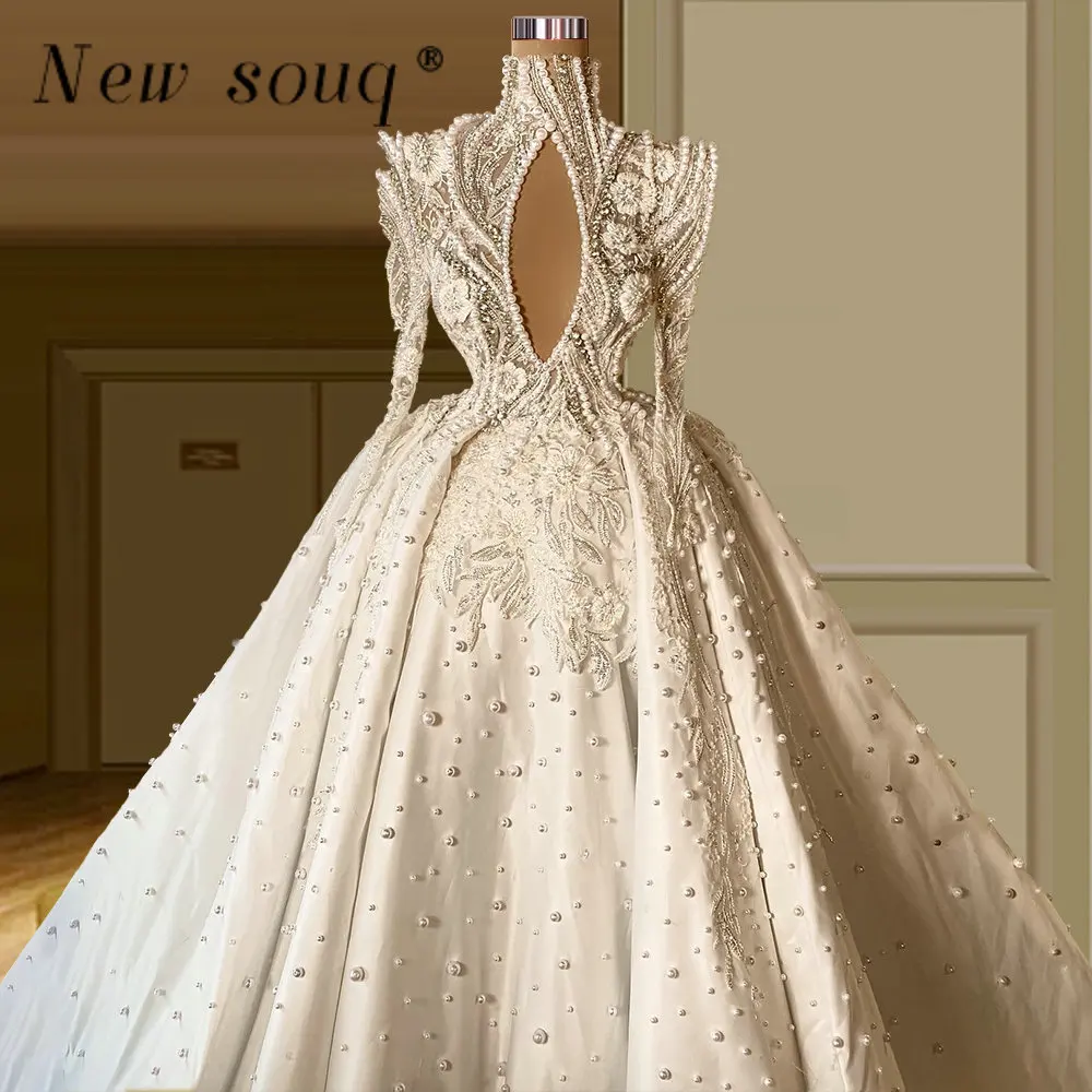 

Luxury Dubai Muslim Keyhole High Neck Pearls Wedding Dresses 2023 Arabic Long Sleeves Puffy Ball Gown Satin Bridal Gowns