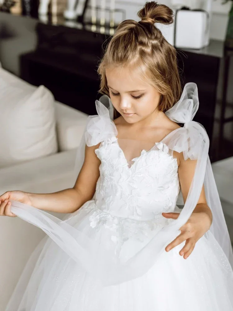 Con coda e spalla con fiocco senza maniche per matrimonio, compleanno, abiti da prima comunione, abiti da ragazza di fiori, applicazioni in tulle bianco