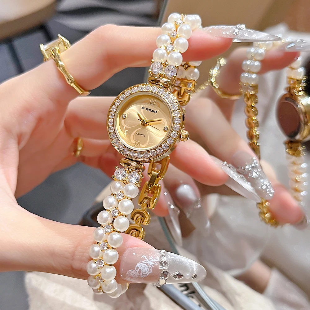ساعة X-GEAR النسائية الأنيقة باللؤلؤ - ساعة يد كوارتز فاخرة مع سوار من الفولاذ المقاوم للصدأ