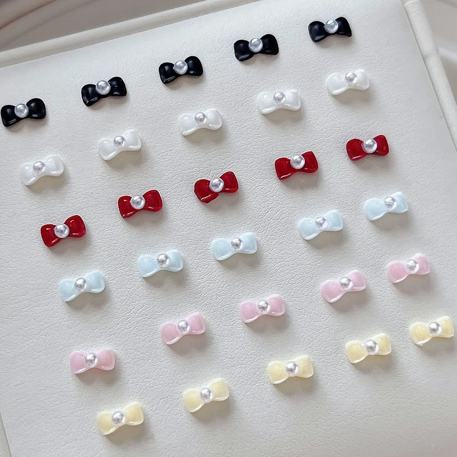 

Exquisite French Elegant Bowknot Pearl Bow Tie Cute Resin Ribbon Charm Sweet Nail Art Decorations Manicure Accessories Wholesale