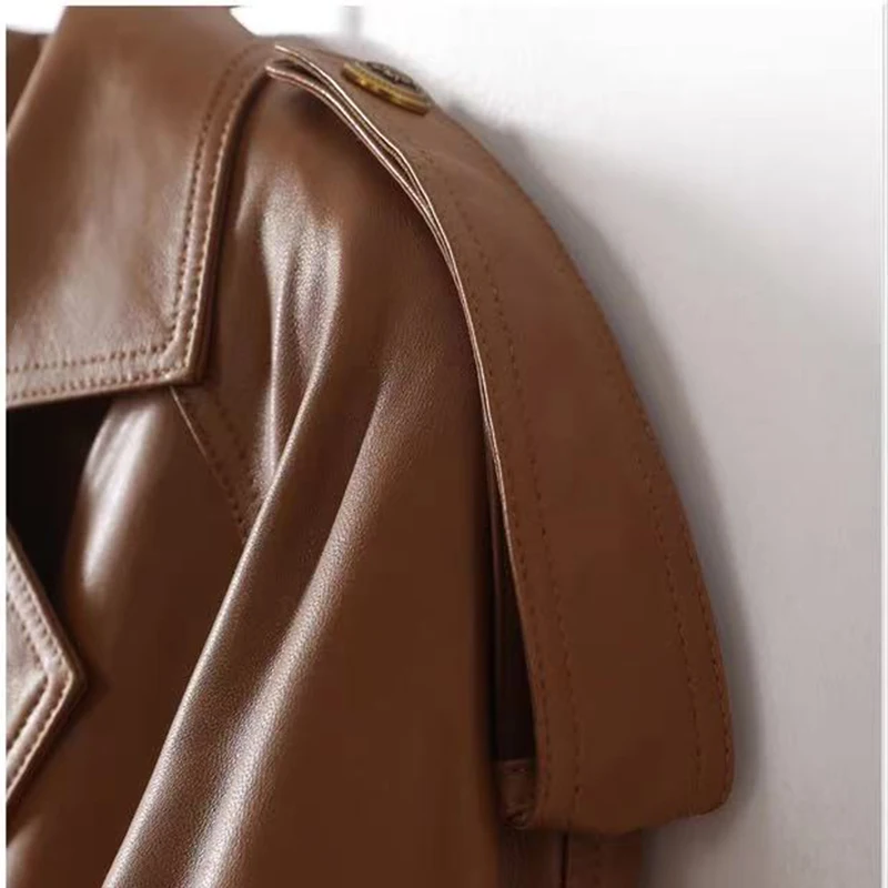 Giacche in pelle di lusso di alta qualità Autunno Inverno Cera olio Pelle di pecora Colletto Cintura Slim Streetwear Trench lungo Donna