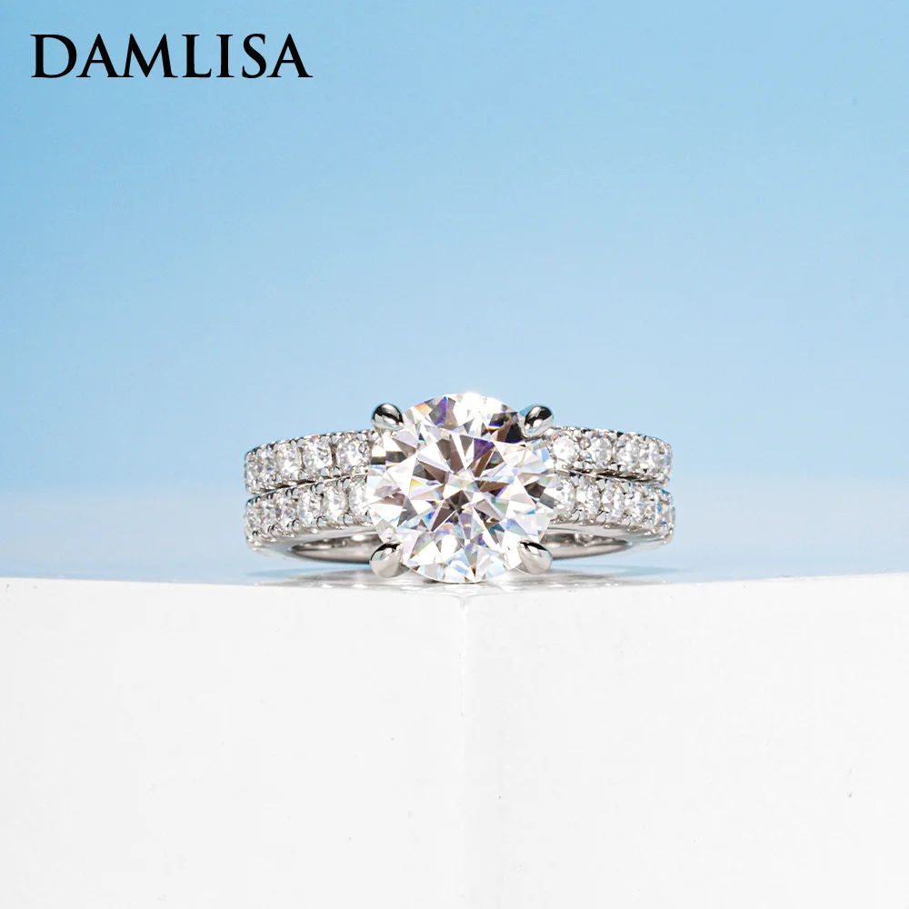 

DAMLISA 3ct Main Stone (4.15cttw) Round D Color Moissanite Engagement Ring for Women Wedding Band 925 Sterling Silver Bridal Set