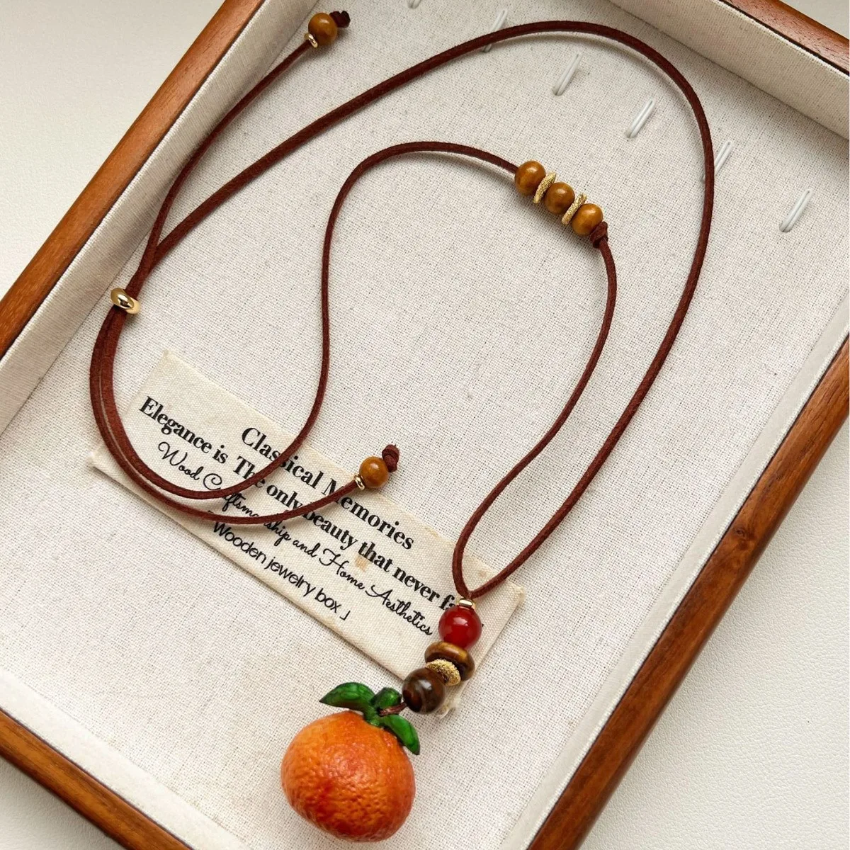 Niche design fruit pendant necklace high-end drawstring light luxury jewelry
