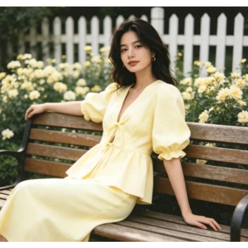 

Women's 2026 Spring Summer Puff Sleeve V Neck Tie Front Top and High Waist Skirt Set Casual Two Piece Outfit