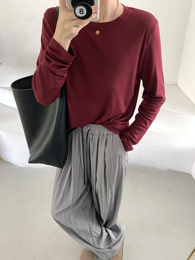 T-shirt ampia a maniche lunghe girocollo tinta unita casual da donna autunno e inverno