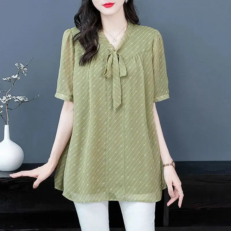 Fashion V-Neck Spliced Lace Up Bow Printed Chiffon Blouse Women\'s Clothing 2023 Summer New Oversized Casual Tops Commute Shirt