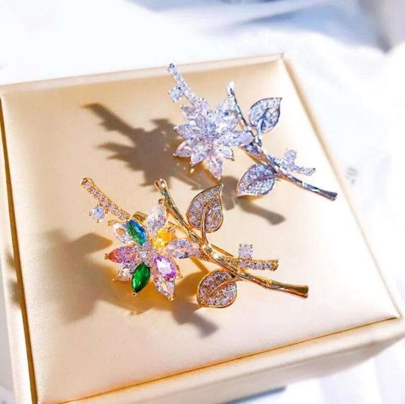 เข็มกลัดแฟชั่นเพทายรูปดอกไม้แฟชั่นคลาสสิกสีสันสดใสของผู้หญิงเข็มกลัดเย็นสุดสร้างสรรค์ของขวัญ aksesoris Bros