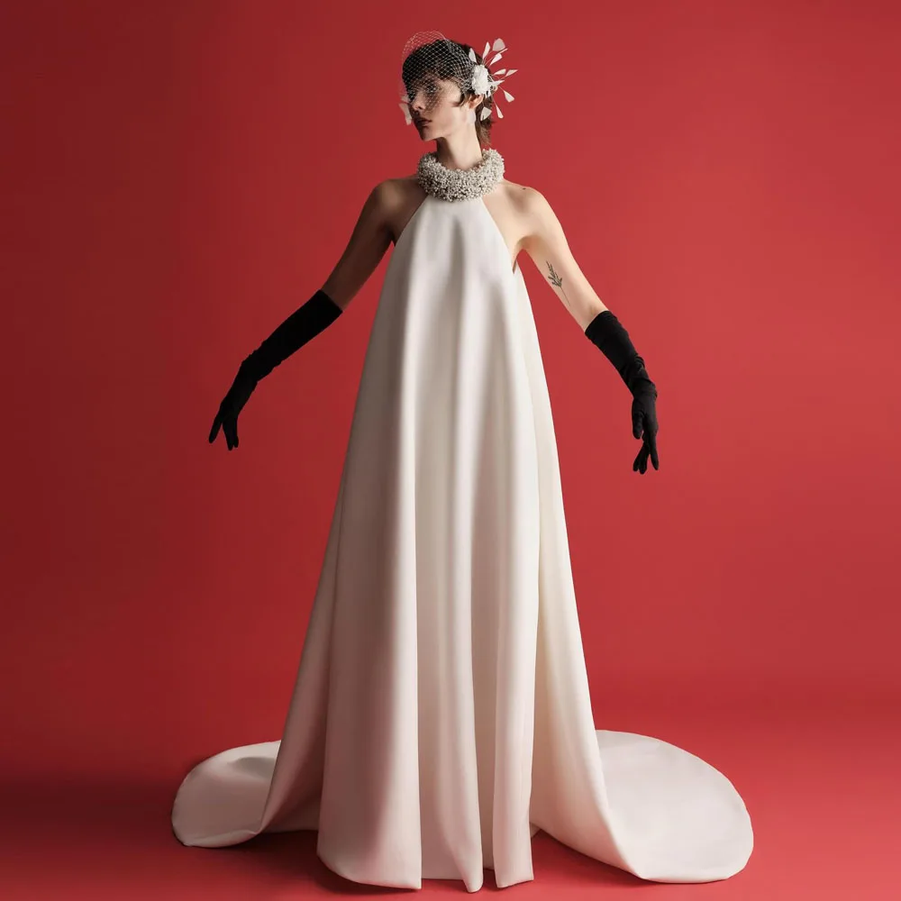 Скромные белые длинные вечерние платья с бретелькой на шее из бисера Скромные свободные свадебные платья трапециевидной формы Длинное платье макси Свадебный халат Скромные белые длинные вечерние платья с бретелькой на шее из бисера Скромные свободные свадебные платья трапециевидной формы Длинное платье макси Свадебный халат