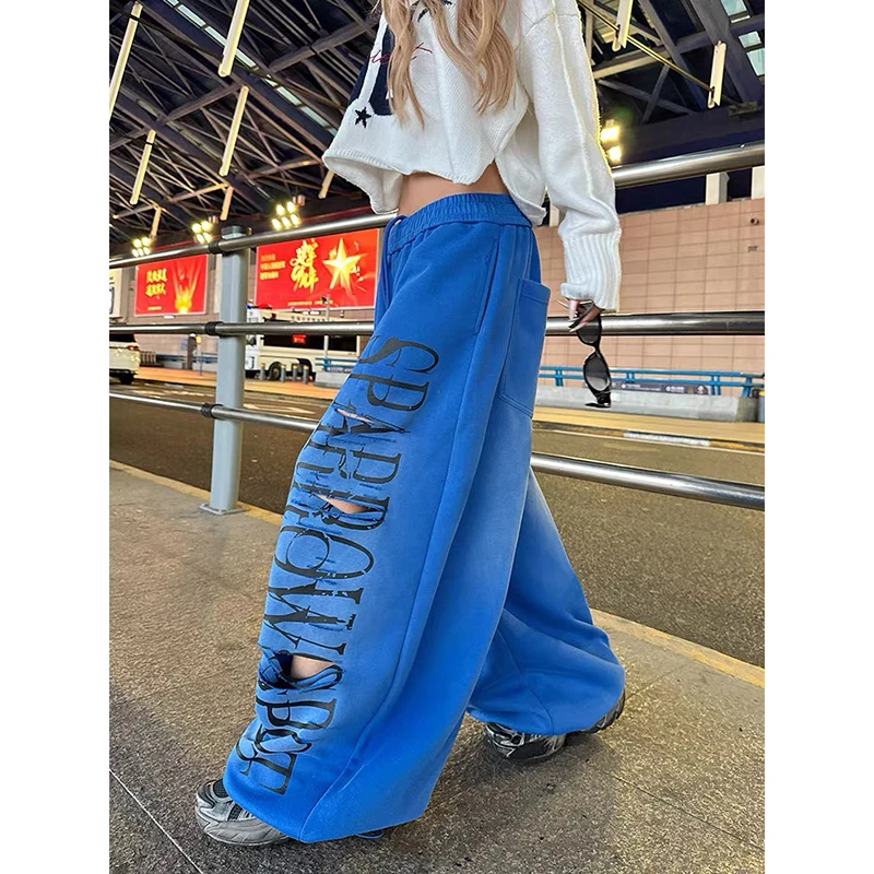 Women Red Baggy Letter Print Ripped Sweatpants Oversize Dance Pants Harajuku Aesthetic 2000s Style Vintage Y2k Wide Trousers 5 Women Red Baggy Letter Print Ripped Sweatpants Oversize Dance Pants Harajuku Aesthetic 2000s Style Vintage Y2k Wide Trousers 5