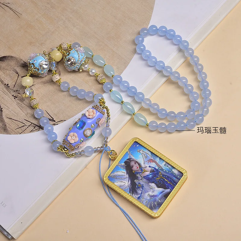 

Расписанный вручную золотом кулон-подвеска с изображением Зеленой Тары, портативный буддийский амулет.