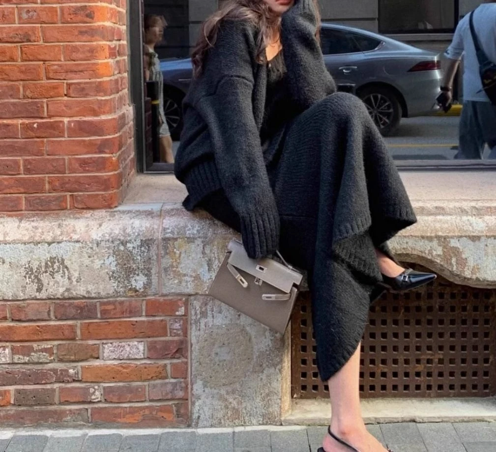 Otoño-Invierno estilo perezoso jersey con cuello en V Top de lana de punto y falda conjunto de dos piezas de moda