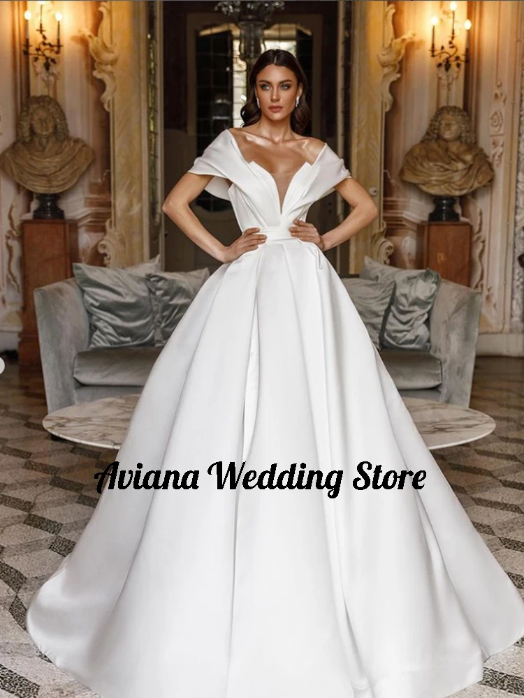 Vestidos de novia sencillos de moda personalizados con hombros descubiertos y escote en V profundo vestidos de novia con abertura lateral Vestido de novia 2025