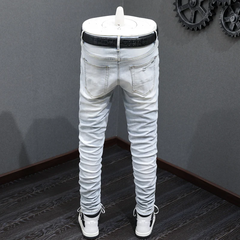 

y2kStreet fashion boutique men's retro light blue jeans elastic tight patch jeans men's designer hip-hop brand pants Hombre