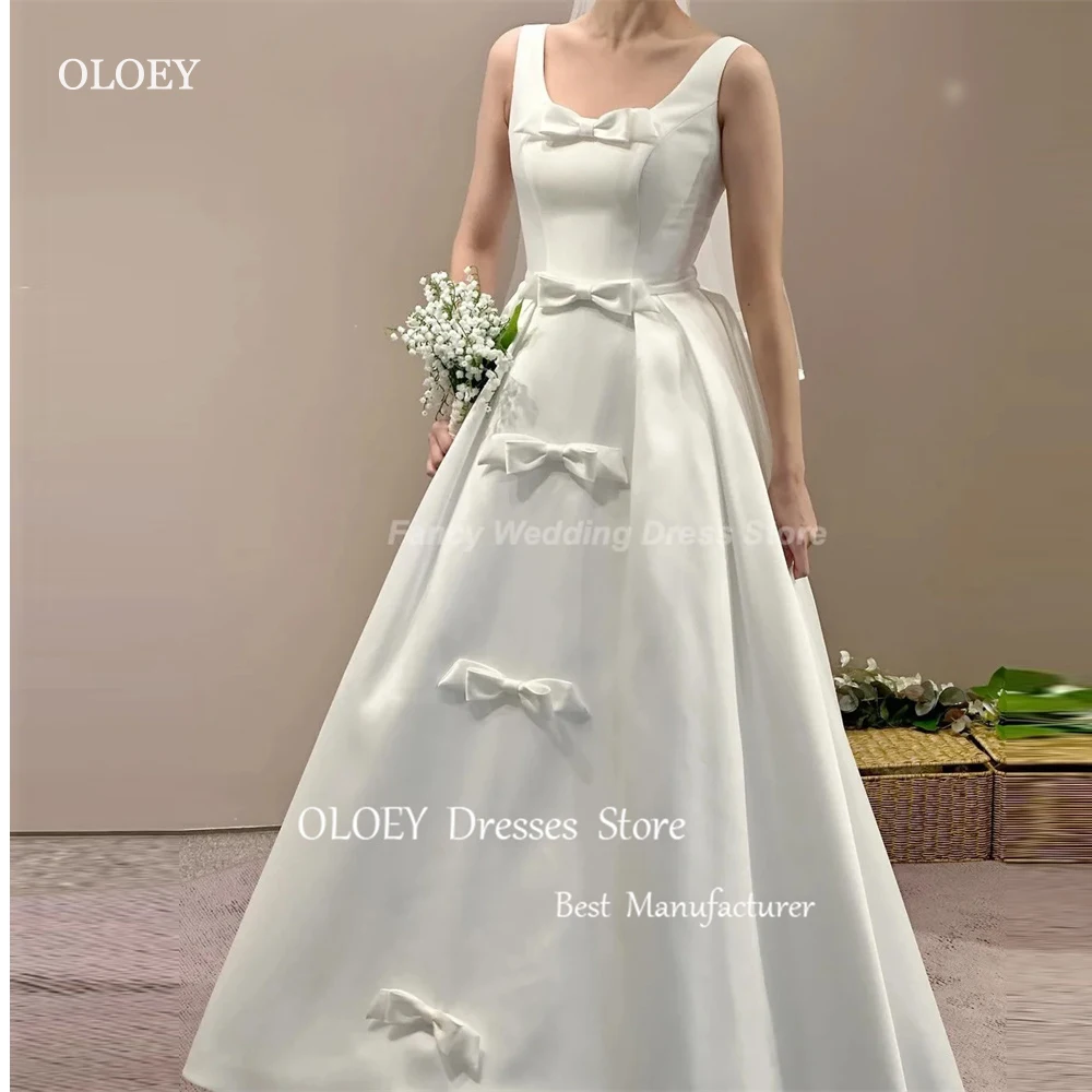 OLOEY semplice abito da sposa collo quadrato corea servizio fotografico una linea senza maniche fiocco lunghezza pavimento abito da sposa corsetto indietro