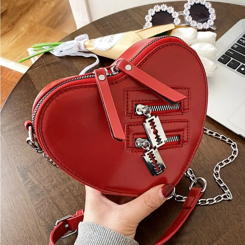 

New Summer All-match Sweet Cool Love Shape Commuter Bolsas Personality Zippers Design Leisure Crossbody Pack Advanced Sense Bag