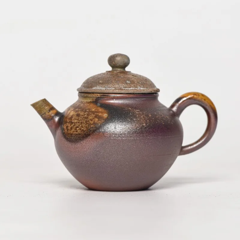 

Black pottery texture nails, firewood pot, purely handmade naked burning, raw ore teapot