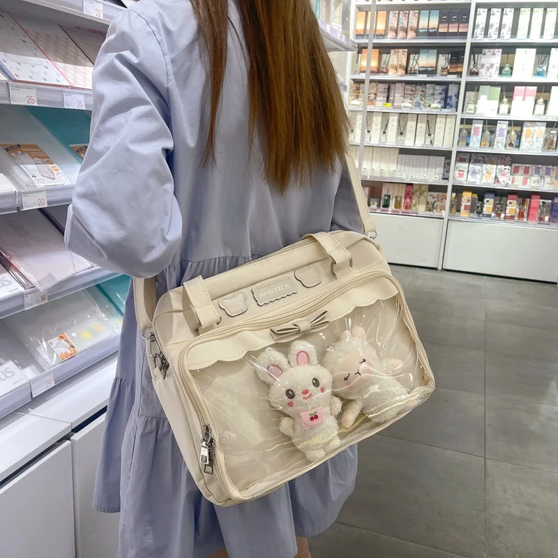 

Japanese Cute Transparent Canvas Itabag Fashion Girls One Shoulder Bag Student Personality Crossbody Bag with Badge Doll Ita Bag