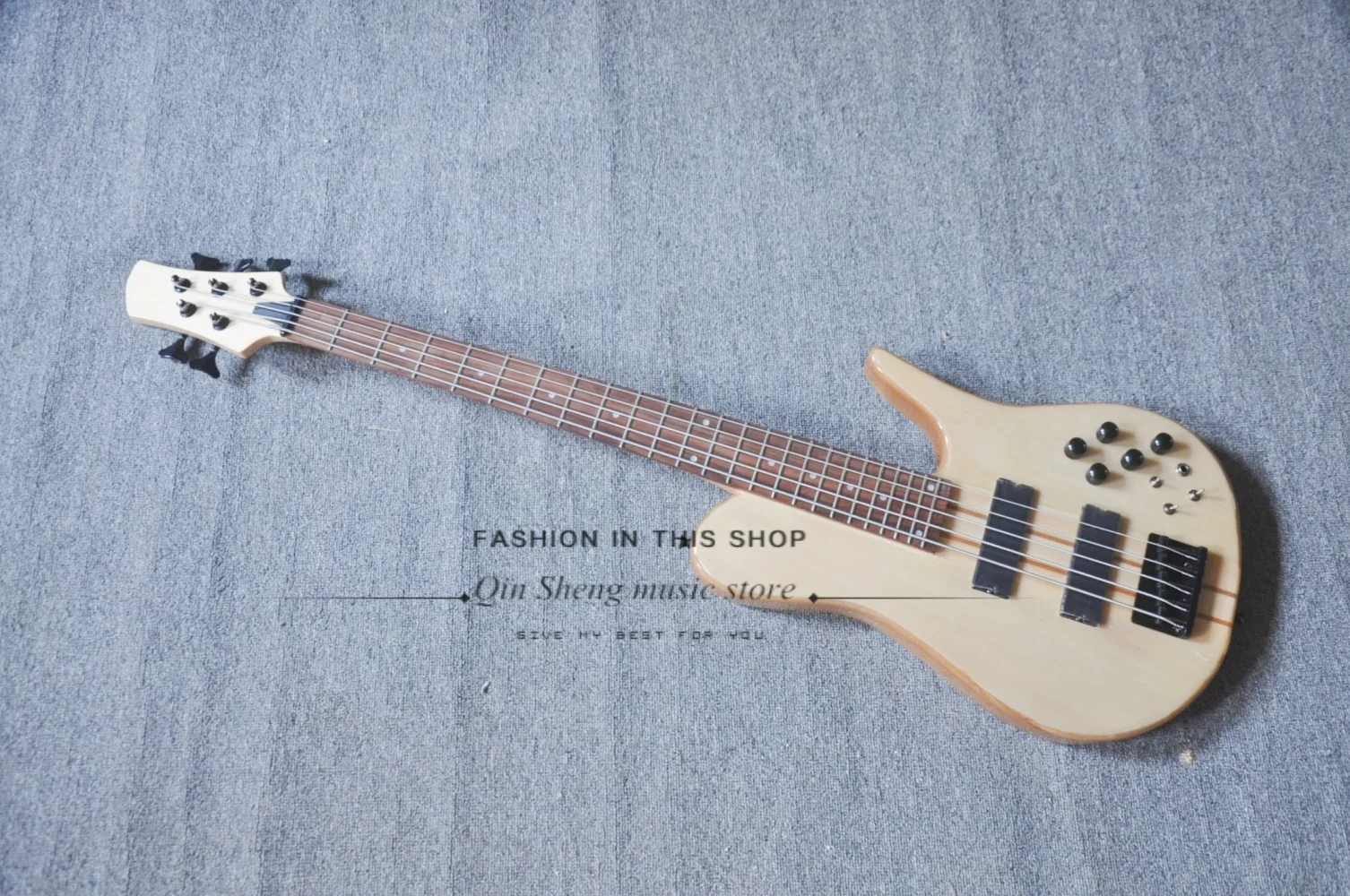 5 string natural guitar, fixed bridge, maple neck  though ASH wood body , black tuner, factory custom
