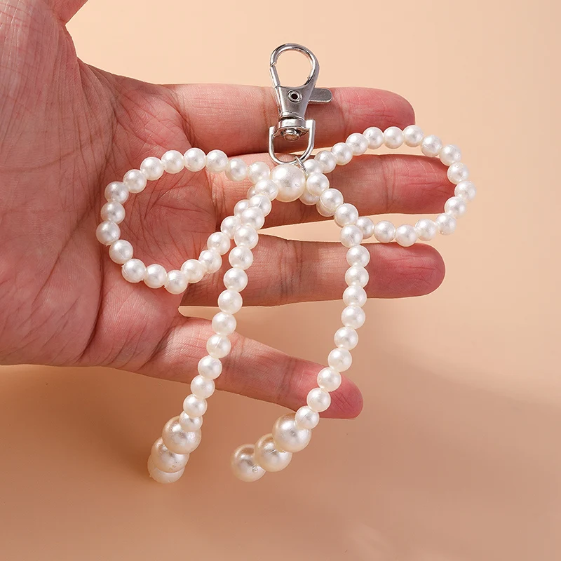 لطيف اليدوية اللؤلؤ Bowknot المفاتيح للنساء فتاة لسيارة مفتاح حامل حلقة رئيسية حقيبة يد قلادة اكسسوارات DIY بها بنفسك مجوهرات هدايا