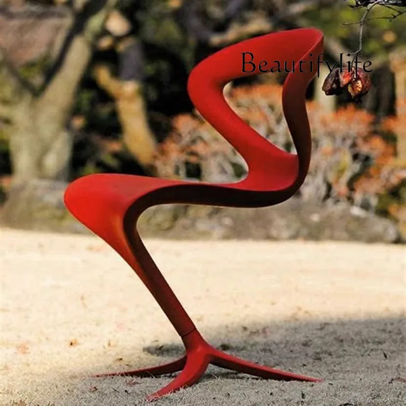 

Nordic designer personality and creativity heterosexual hollow chair model house sales office backrest casual fashion