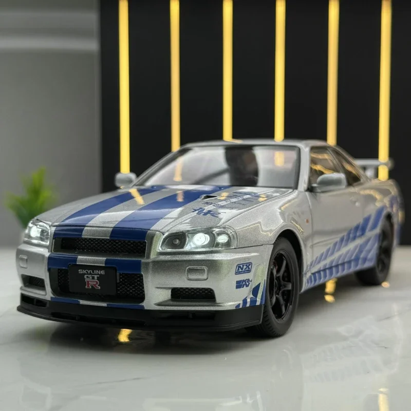 Velocidade selvagem 1/24 nissan skyline GT-R r34 liga modelo de carro 1/32 jdm coletivo miniatura voiture diecast brinquedo veículo menino decoração