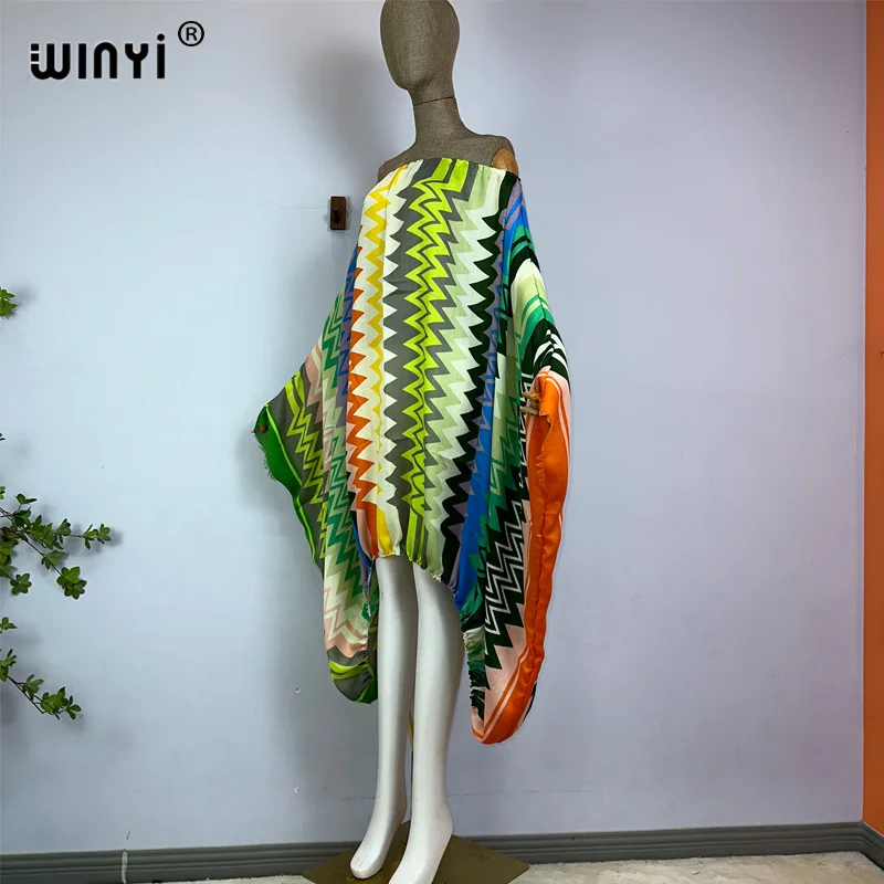 WINYI-vestido maxi sexy de pescoço único para mulheres, vestido boho, estampa colorida, manga batwing, kaftan feminino, capas de praia, verão