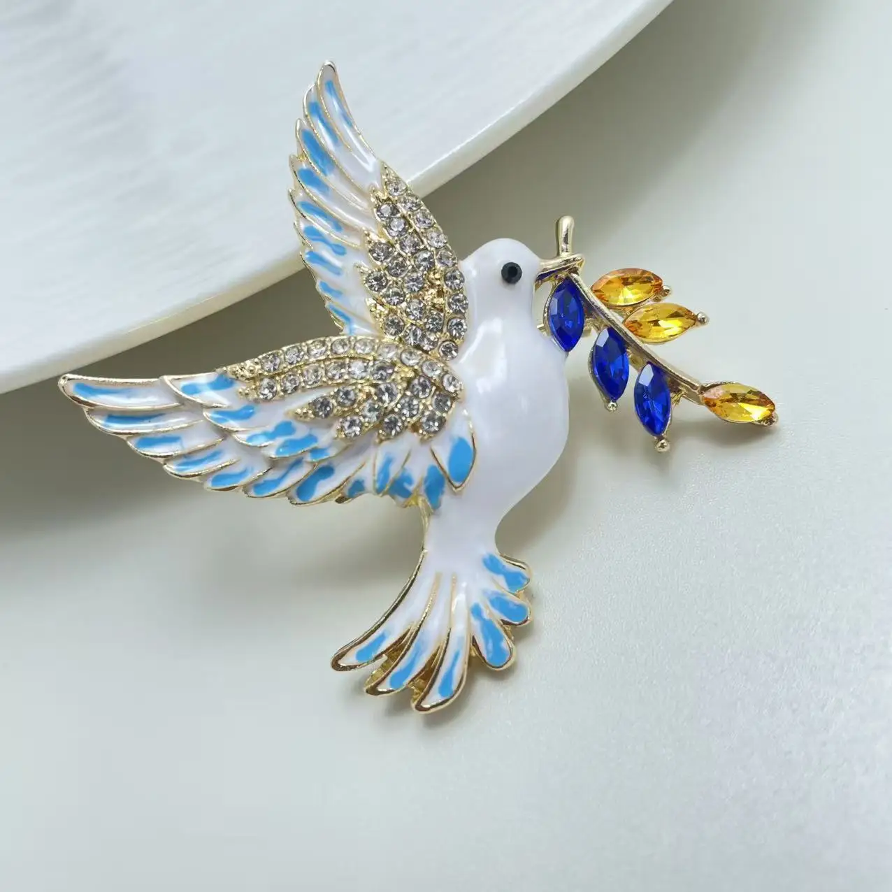 Wholesale of Alloy Enamel Peace Dove Brooch with Dripping Oil Crystal Chest Flower Pin view 6