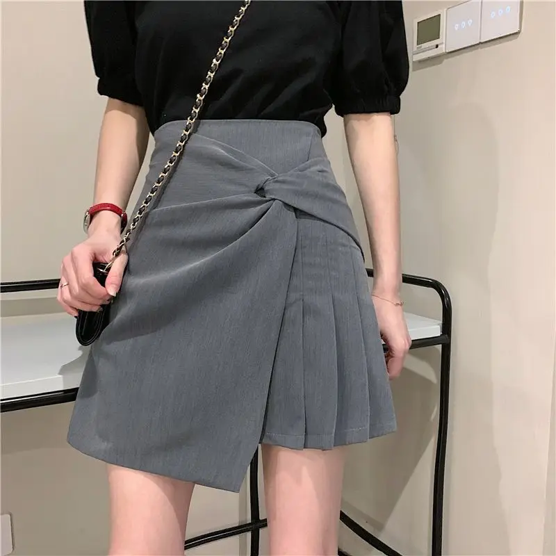 

Fashion Zipper Folds Solid Color Asymmetrical Pleated Skirts Women's Clothing 2024 Summer New Loose Office Lady Irregular Skirts