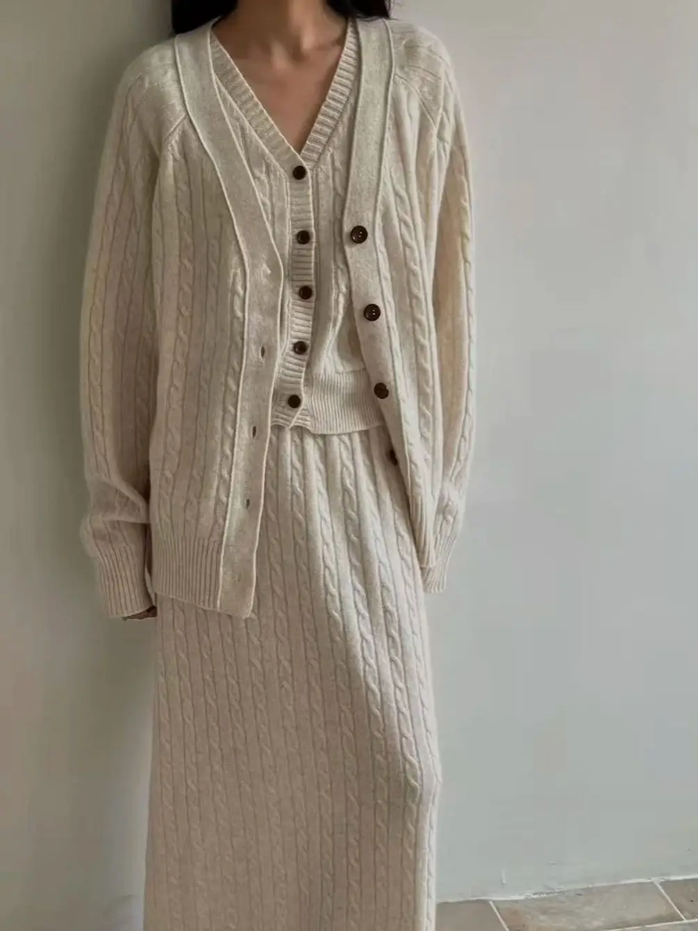 

Women Twisted Knitted 3-Piece Set Sleeveless O-Neck Vest + Single Breasted Cardigan + Elastic Waist A-Line Long Skirt Suit