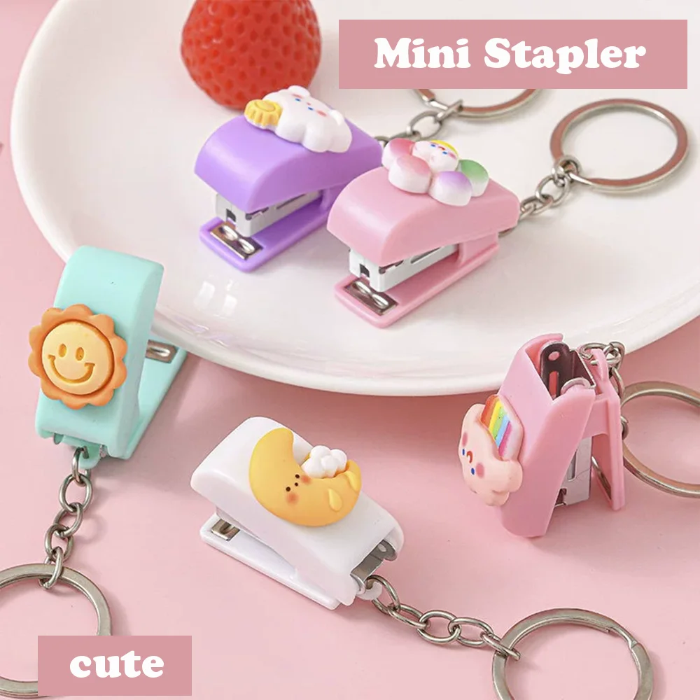 1pc Pink/white cartoon student mini stapler, small and portable, can be used as a keychain, with size 10 staples