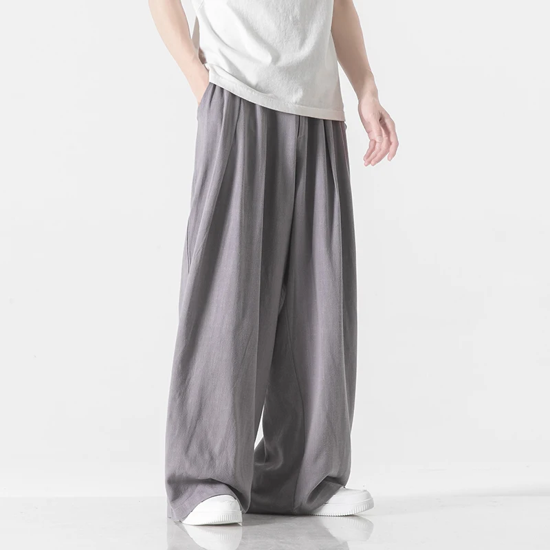 Pantaloni Harem da uomo in lino di cotone stile coreano pantaloni Casual solidi pantaloni sportivi da donna Casual Vintage di grandi dimensioni a