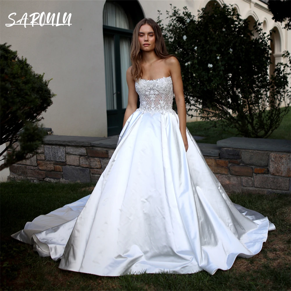 

Luxury Crystal Details Wedding Dress Satin Ball Gown Sleeveless Bride Dresses Lace Appliques Chapel Train Bridal Gown Plus Size