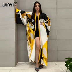 Letnie kimono afrykańskie kobiety WINYI ubierają się na plażę maxi dress blogerzy polecają swetry rozpinane okrycie plażowe abaya dubai luxury