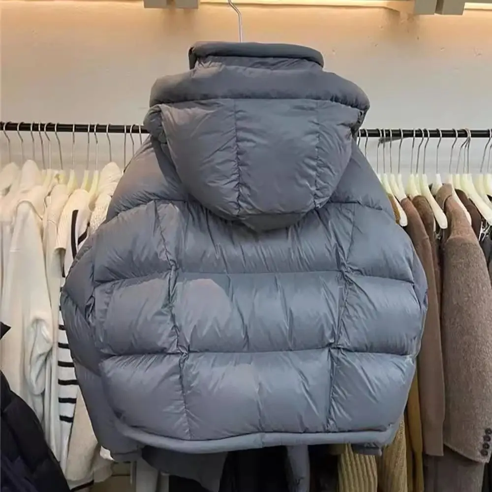 Giacche corte in cotone da donna Colletto rialzato invernale Cappotti in cotone con cappuccio Cappotto caldo spesso stile coreano 2025 Nuovo parka da neve