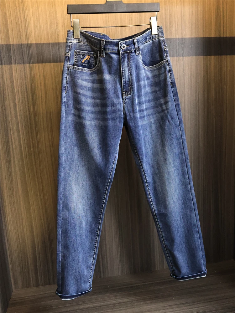 

Удобные для кожи мягкие мужские однотонные джинсы с прямыми штанинами, повседневные брюки из хлопка, эластичная джинсовая ткань, современная длинная футболка со средней талией...