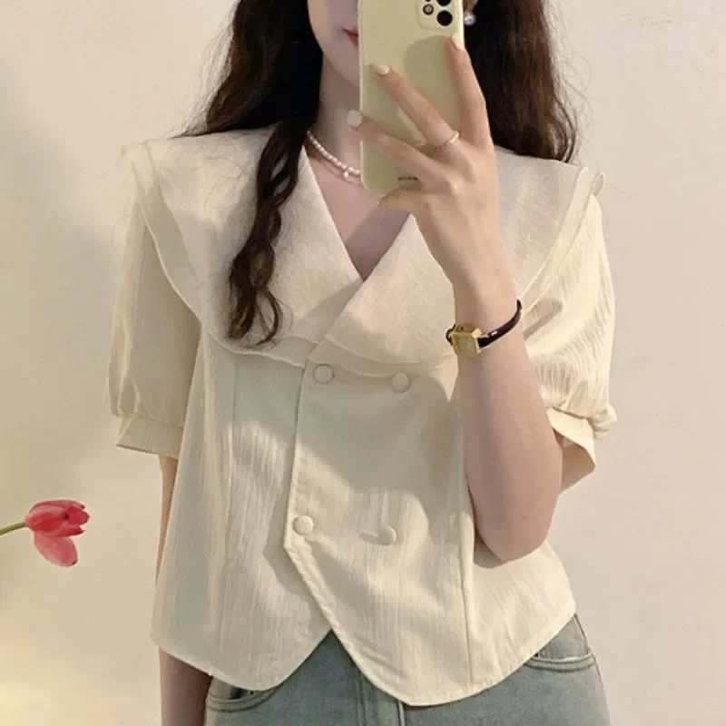 Camicia fresca a maniche corte da donna Estate 2025 Camicie con colletto alla Peter Pan in stile coreano con bordo a foglia di loto