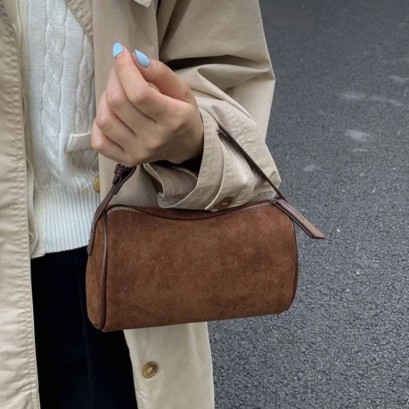 

Винтажная женская сумка Hatbox с уникальной круглой формы и роскошным кожаным покрытием