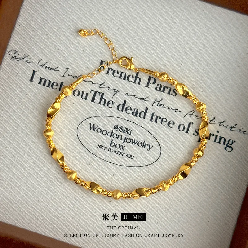 

24K super flash brushed cat eye dissipation twist bead bracelet 9999 real gold light luxury niche twist beaded cat eye bracelet