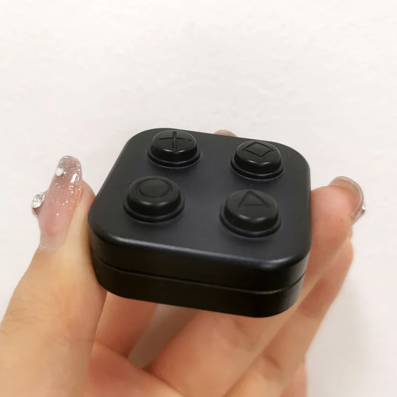 Giroscopio con punta delle dita in metallo EDC con cursore magnetico a quattro pulsanti con scheda di spinta infinita per giocattolo da tavolo di decompressione e relax