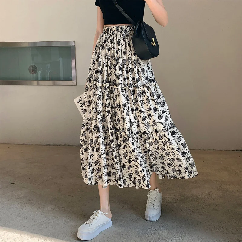 2023 New Summer Fashion Trend Fragmented Flower High Waist Covering Meat Casual Loose Fit Small Women's A-line Half Skirt