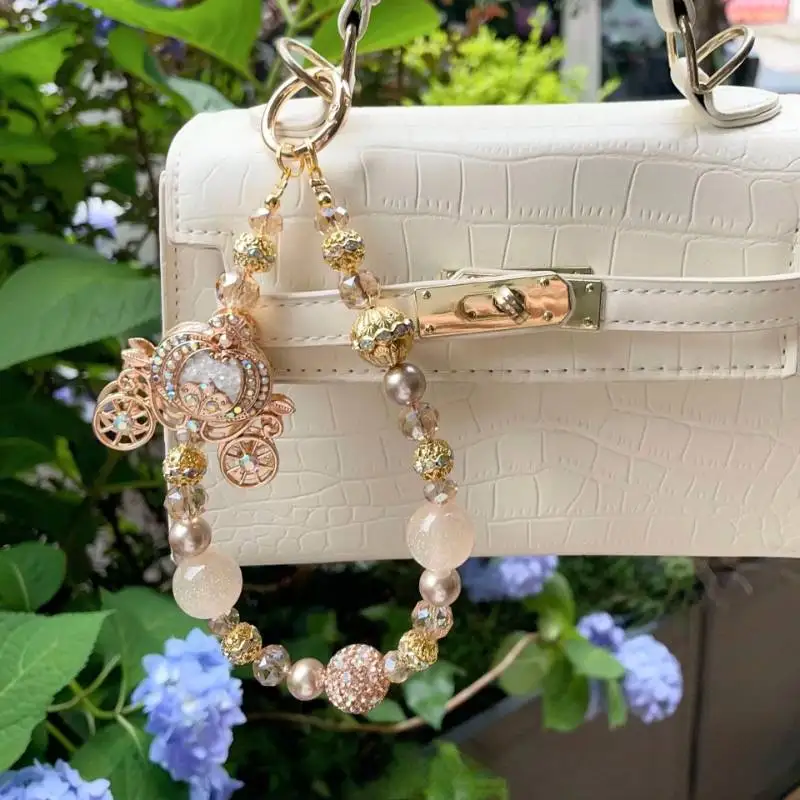 Premium Sense Dream Champagne Pumpkin Car Beaded Mobile Phone Bag Chain Heavy Industry Diamond Inlaid Gentle Niche Bag Hanging