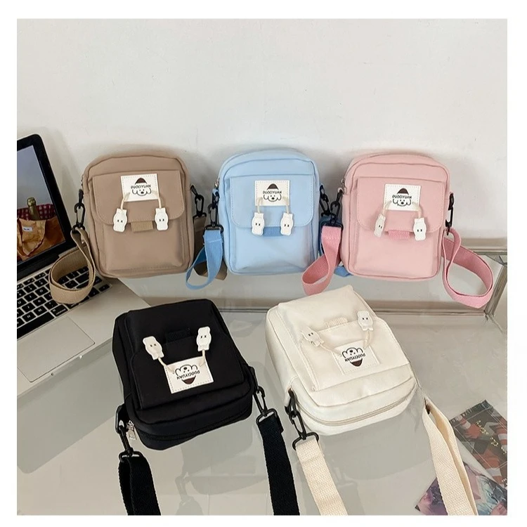 

Nylon lightweight and cute crossbody bag for young girls, cartoon color contrast commuting waterproof crossbody backpack