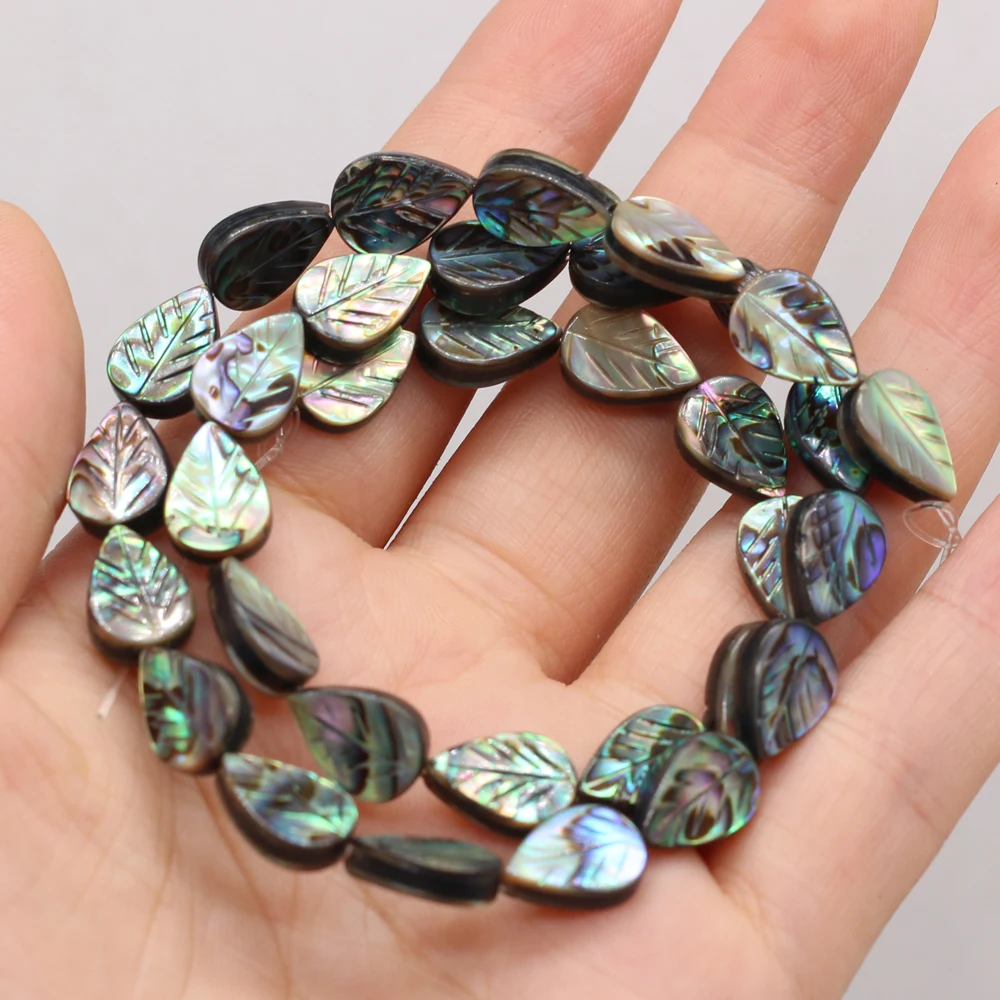 33 Stück/Strang, blattförmige Perlen aus Abalone-Muschel, 8 x 12 mm, zum Basteln von Schmuck, für DIY-Halsketten, Armbänder, Ketten und Ohrringe. – Detail 2