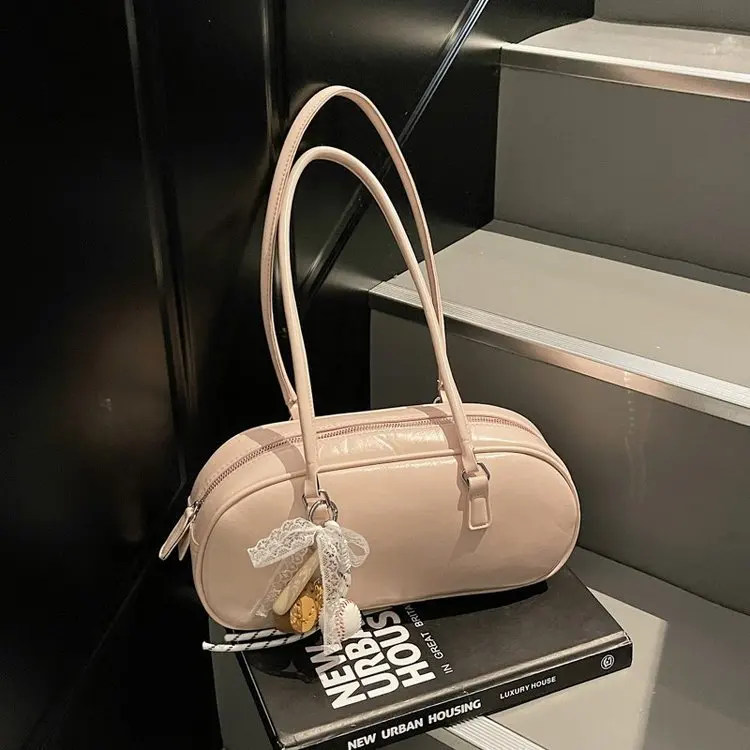 

Дизайнерская сумка через плечо 2025 года — The Modern Essential