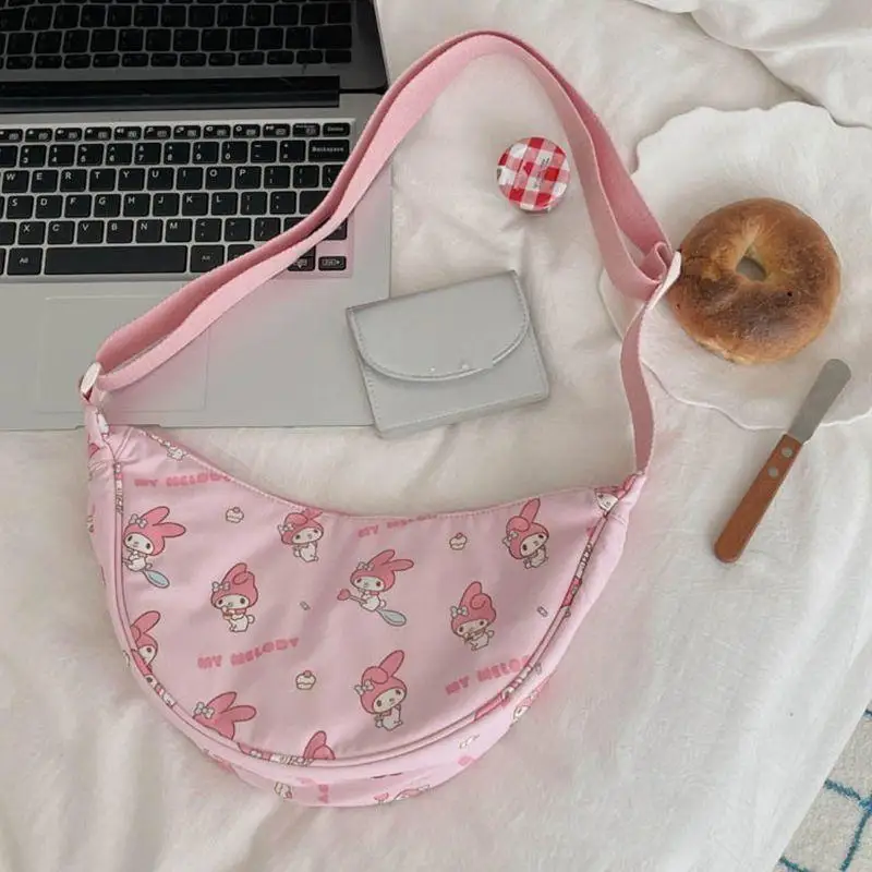 

Sanrio young girl shoulder bag Hello Kitty Kuromi female cartoon Versatile messenger bag Portable fashion Shopping kawaii wrap