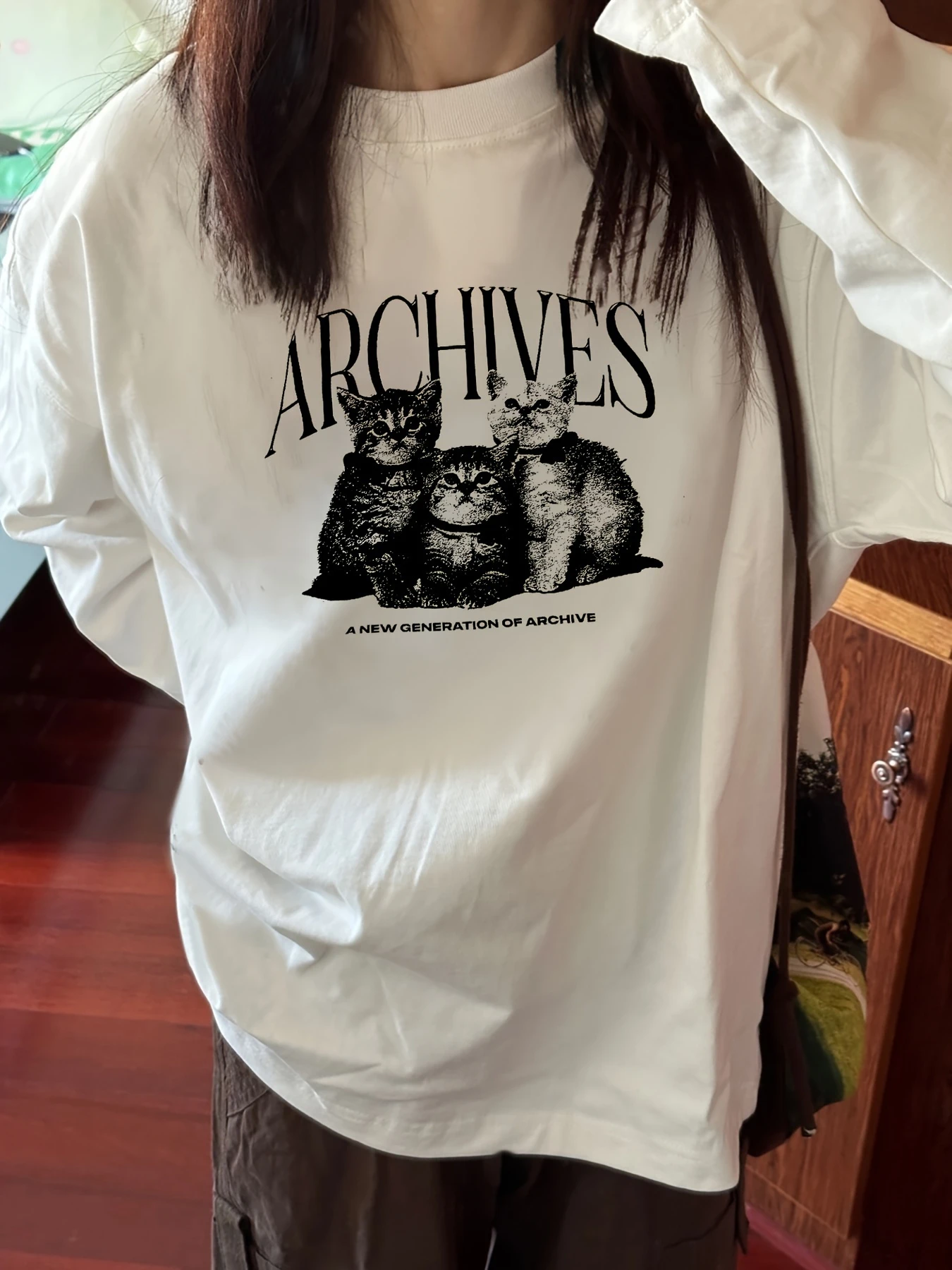 T-shirt à manches longues avec imprimé chat mignon pour femme, haut ample pour l'automne et l'hiver
