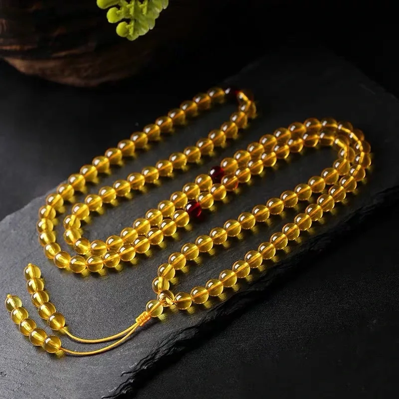 

Natural Myanmar purified water golden amber hand string honey wax Bracelet single circle round bead hand string Buddha transfer