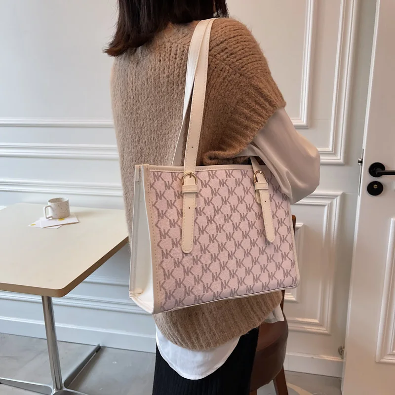 

The new summer 2023 fashion lady handbags and women tote bag printed capacity commuter students single shoulder bag