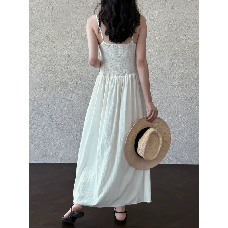 Abito da donna stile vacanza al mare con scollo a V francese Abito da donna senza maniche semplice ed elegante nero bianco sexy per festa di nozze