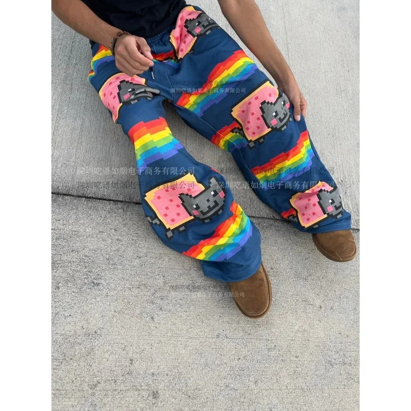 نيان كات بكسل طباعة السراويل الرجال 2025 جديد المتضخم فضفاض الشارع الشهير قوس قزح نمط بناطيل كاجوال Harajuku موضة مريحة